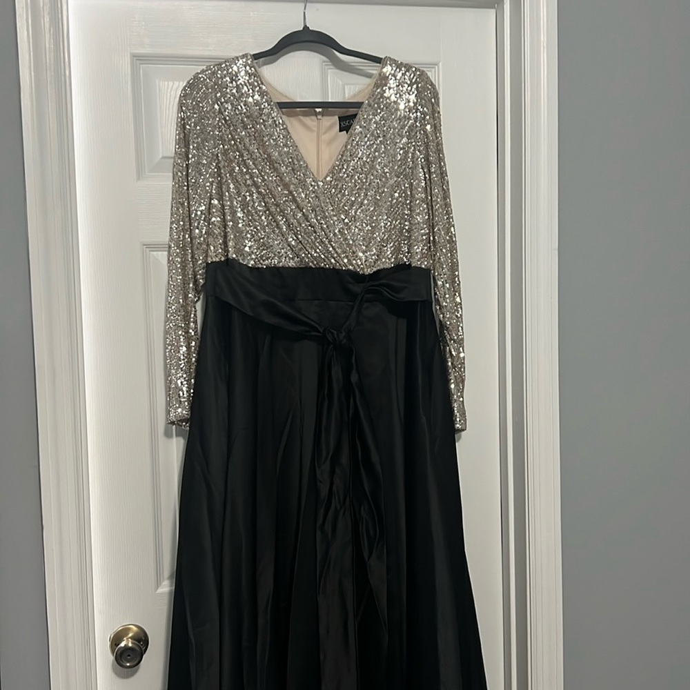 XScape formal dress with silver sequined top and black satin bottom.